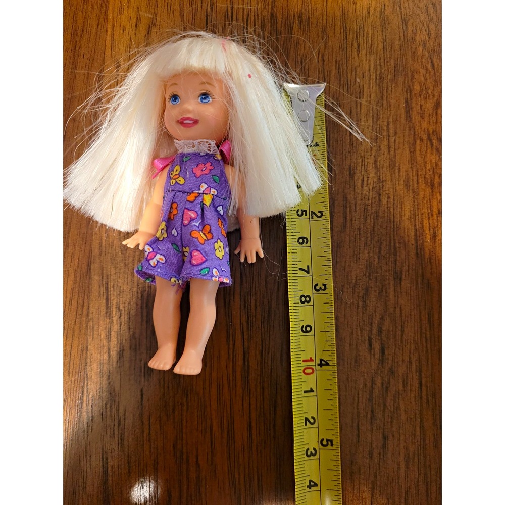 Vintage 1997 Mattel Power Wheels Kelly Doll Barbie Sister Purple Floral Romper